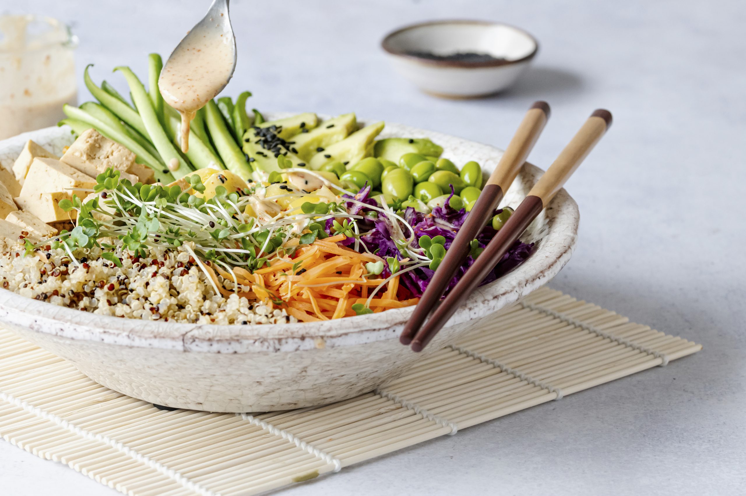 Vegan poke bowl with marinated tofu photography